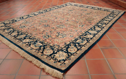 the very fine wool has silk woven to highlight some of the pattern details.